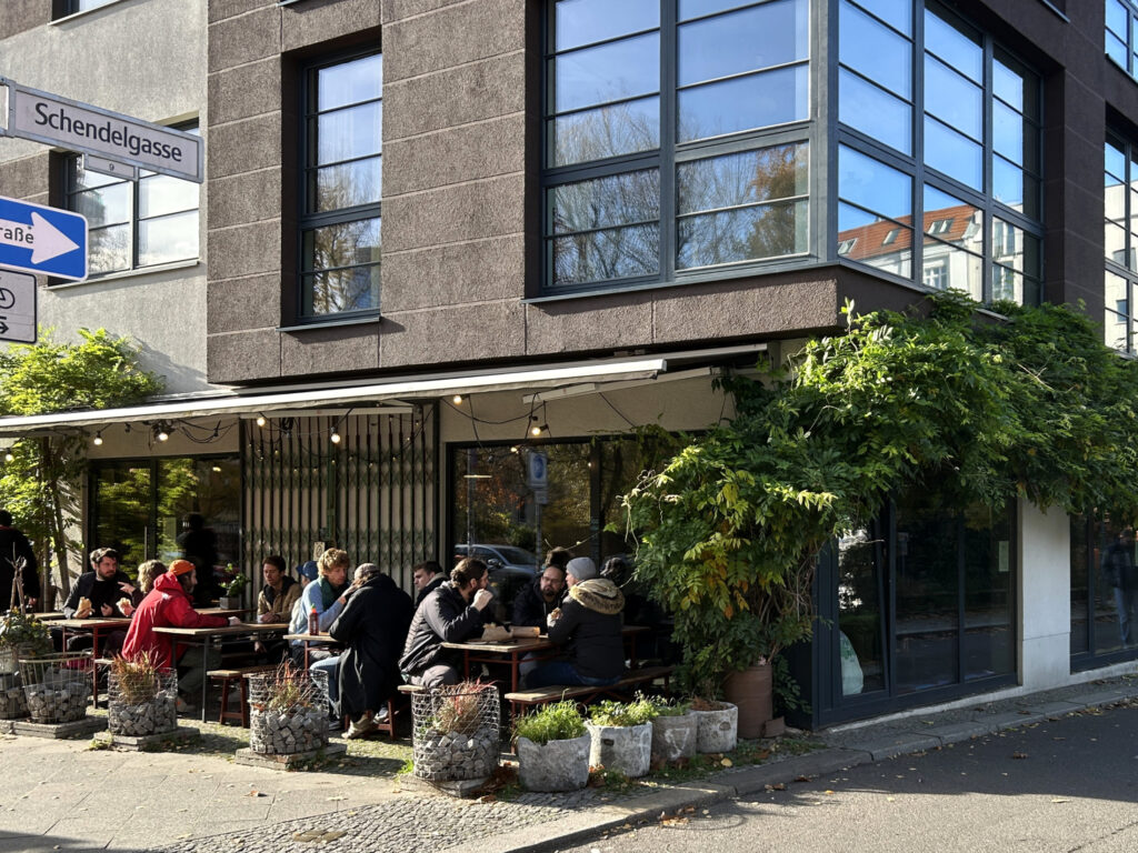 The sidewalk tables outside Banh Mi Stable.