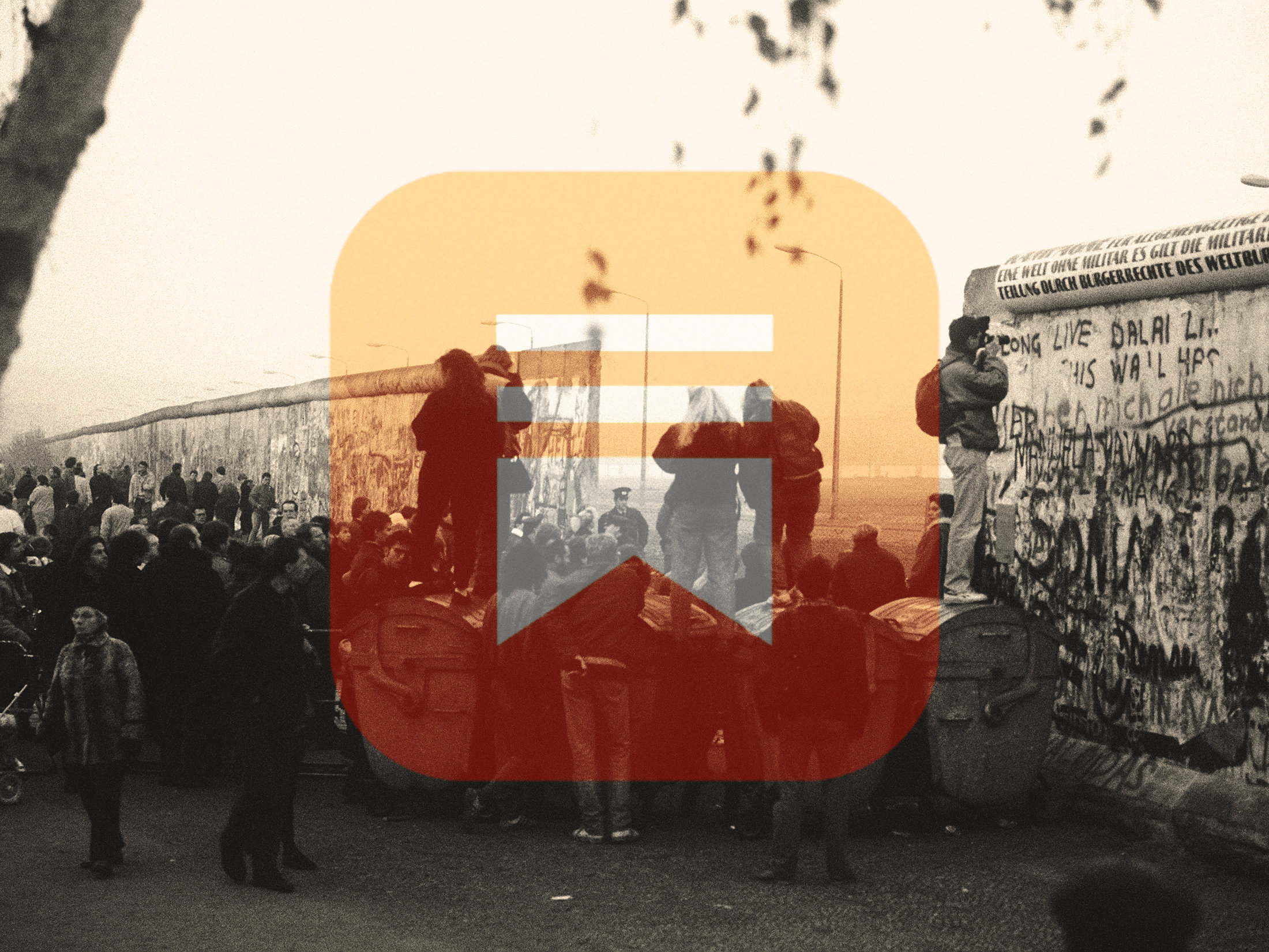 A crowd of West German citizens gathers at the newly created opening in the Berlin Wall at Potsdamer Platz.